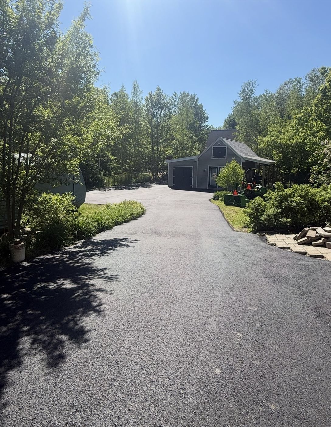 Freshly paved asphalt driveway